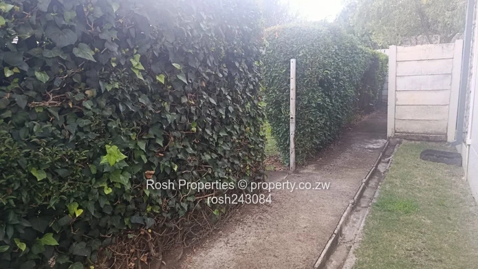 Avondale 2-Bed Garden Flat — Verandah & Borehole