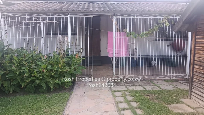 Avondale 2-Bed Garden Flat — Verandah & Borehole