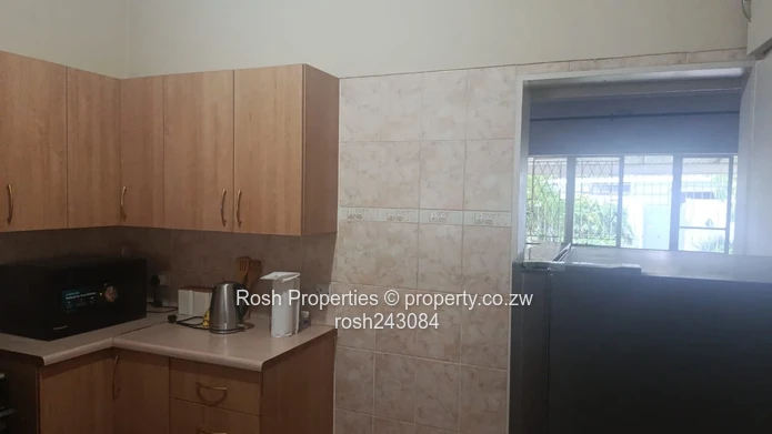 Avondale 2-Bed Garden Flat — Verandah & Borehole