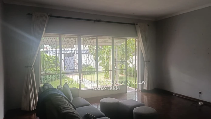 Avondale 2-Bed Garden Flat — Verandah & Borehole