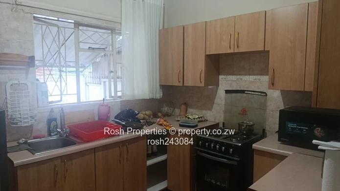 Avondale 2-Bed Garden Flat — Verandah & Borehole