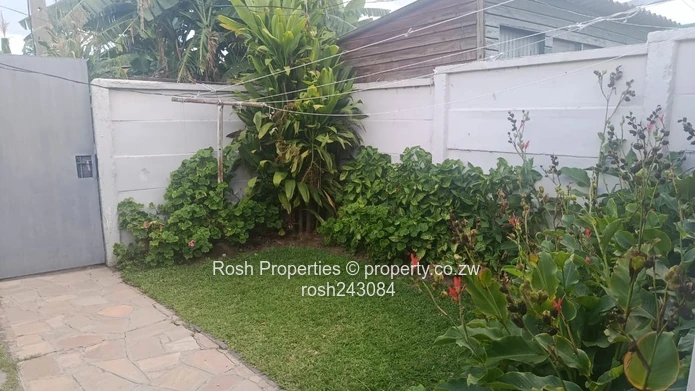 Avondale 2-Bed Garden Flat — Verandah & Borehole