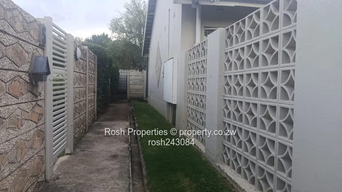 Avondale 2-Bed Garden Flat — Verandah & Borehole