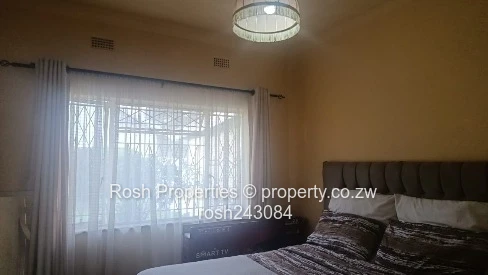 Avondale 2-Bed Garden Flat — Verandah & Borehole