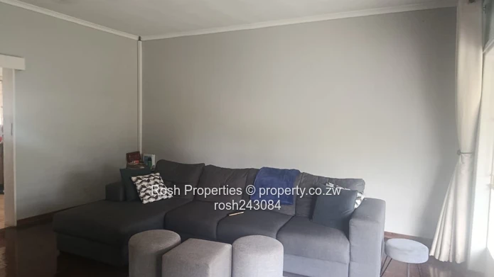 Avondale 2-Bed Garden Flat — Verandah & Borehole