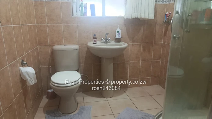 Avondale 2-Bed Garden Flat — Verandah & Borehole